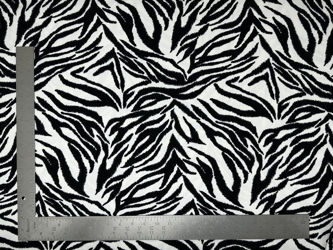 Liverpool Knit Animal Print Fabric | Express Knit Inc.